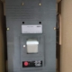 AEG MCL1258N 1000A 3-pole 60kA @415V circuit breaker, industrial-grade, grey housing with model label and connection points.